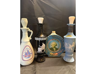 COLLECTION OF FOUR VINTAGE CERAMIC WHISKEY DECANTE...