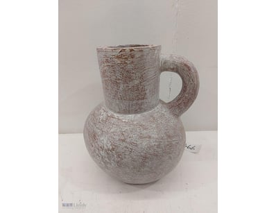 Rustic ceramic pitcher featuring a bulbous lower b...