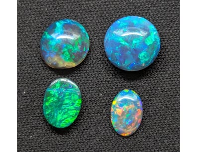 2.75 TCW AUSTRALIAN OPALS

Includes: 
1.32Ct Lig...