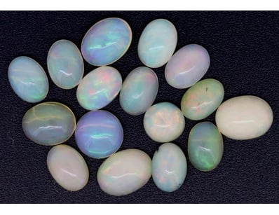 10.01CT TSW X 16 OPALS

Oval/Round Cabochon Cut,...