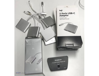 Assorted computer accessories. 3 Ports USB-C Adapt...