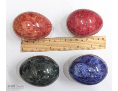 FOUR AGATE CARVED STONE CRYSTAL EGGS FROM BRAZIL

...