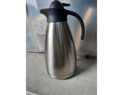 Container of coffee jugs.

Unknown quantity.

...