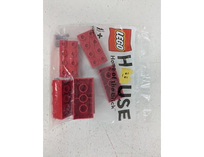 LEGO "Home of the Brick" red brick building set co...