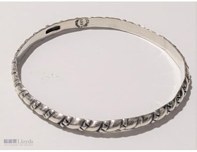 STERLING SILVER MEXICO RIBBED BANGLE     

Marked ...