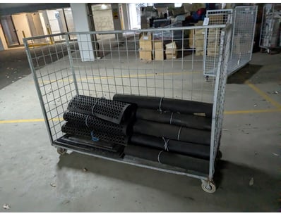 Industrial black mats, with integral geotextile fi...