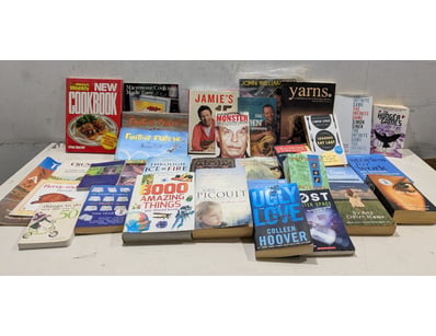 Extensive collection of books spanning multiple ge...