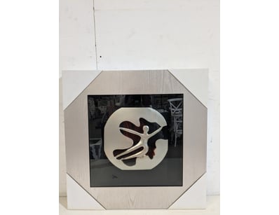 Contemporary sculptural wall art piece featuring a...