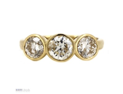 THE CENTRE FEATURES, ONE ROUND BRILLIANT CUT, DIAM...