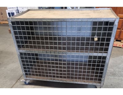 Storage unit, metal, wire door, on mobile castors...