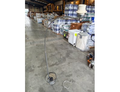 Vintage arc floor lamp featuring a brushed metal c...