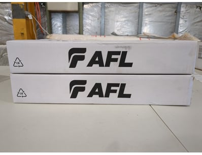 Two AFL brand retail display boxes featuring model...