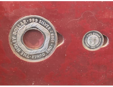 1988 THE HOLEY DOLLAR AND THE DUMP SILVER COIN SET...