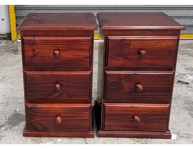 Pair of timber bedside tables with three-drawer co...