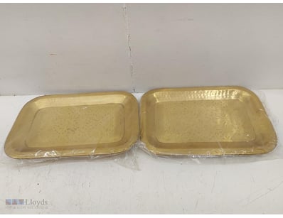 Pair of gold-coloured rectangular serving trays wi...