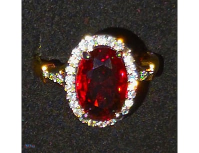 17 TCW GOLD PLATED GARNET AND CZ RING     

Classi...