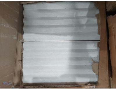 Bulk lot of white marble or stone tiles, neatly ar...