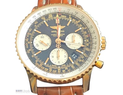 BREITLING NAVITIMER 01 18K ROSE-GOLD, BLACK-DIAL R...