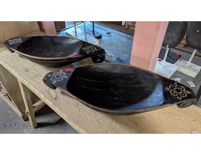 Pair of decorative wooden serving bowls. Each bowl...