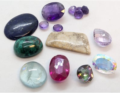88.9 TCW GEMSTONES

Includes 12.7Ct Mystic Stone, ...