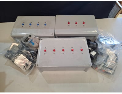 Assorted industrial control boxes, connectors, lig...