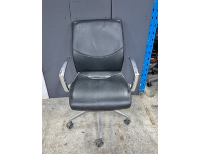 Leather style office chair, black finish.

