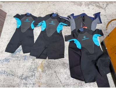 Collection of OceanPro neoprene wetsuits in black ...