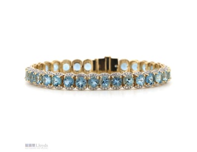 14K YELLOW GOLD, AQUAMARINE AND DIAMOND, LINE HALO...