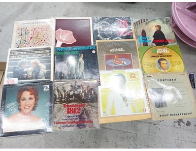 Assorted collection of vintage vinyl records featu...