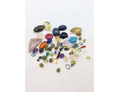 342.3 TCW MIXED GEMSTONES

Includes Fire Opal, Ony...