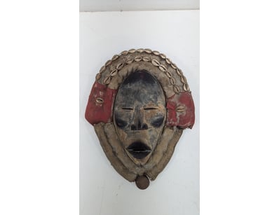 AFRICAN TRIBAL MASK WITH RED EAR CLOTH PANELS

I...
