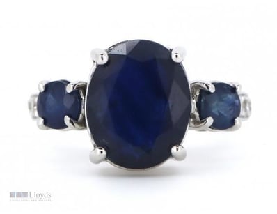 14CT WHITE GOLD, BLUE SAPPHIRE AND DIAMOND, TRILOG...