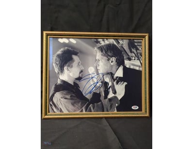 THIS IMAGE FEATURES A FRAMED, SIGNED PHOTOGRAPH FR...