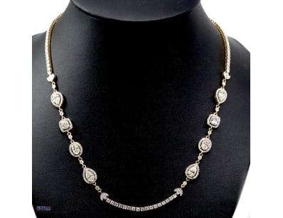 14K YELLOW GOLD AND DIAMOND, HALO NECKLACE.      
...