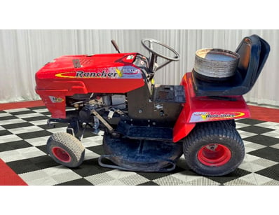 Rover Rancher ride-on lawn mower in red, featuring...