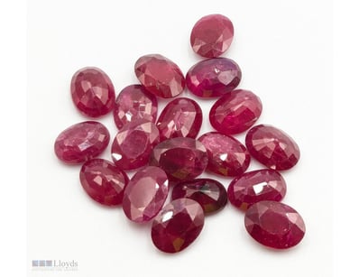EIGHTEEN OVAL SHAPED NATURAL RUBIES

Condition: Go...