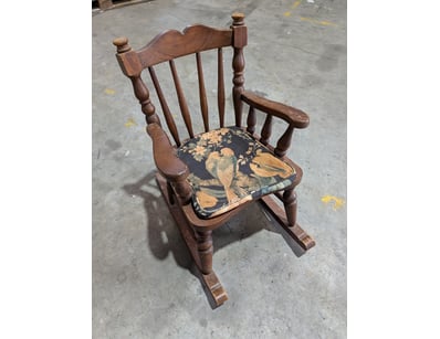 Charming Childs vintage wooden rocking chair featu...