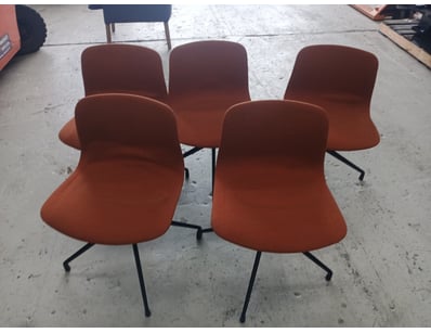 Set of five modern dining chairs featuring burnt o...