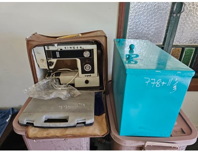 Sewing machine and metal tool box

Sold as lot

On...