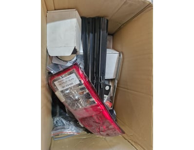 Parts boxes, including hiluux tail light. Switch c...