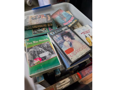 Collection of VHS Tapes Including Singing In The R...