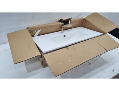 Grade A white ceramic basin featuring a rectangula...