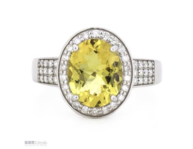 14K WHITE GOLD, HELIODOR AND DIAMOND, HALO RING.  ...