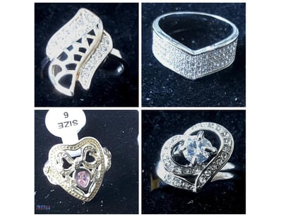 4 SILVER RINGS WITH ZIRCONIAS SIZE 9        

Cond...
