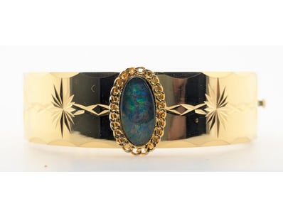 GOLD LOCK OPAL BANGLE


583010+99


