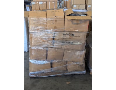 Assorted PPE safety gear including blue work pants...