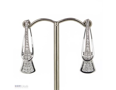 14K WHITE GOLD AND DIAMOND, DROP EARRINGS.      

...