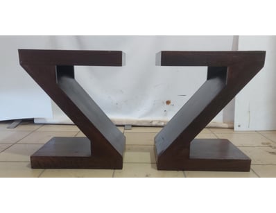 Pair of wooden stools featuring Z-frame design. Co...