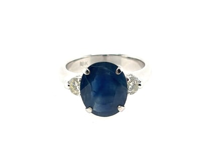 18CT WHITE GOLD SAPPHIRE AND DIAMOND RING

Featuri...