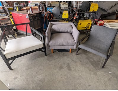 Modern lounge chairs featuring different finishes
...